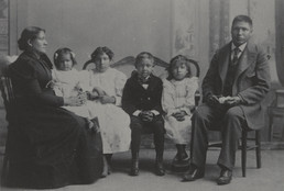 Frances Benjamin Johnston. Benjamin and Ida Brave - Hampton students - and their family. Sioux. 1899-1900